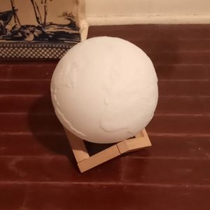 Globe light and stand.